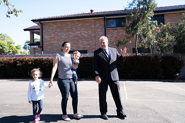 St Therese Catholic Primary School Lakemba - principal showing parent around school