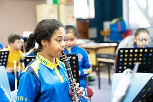 St Therese Catholic Primary School Lakemba - students playing the flute in music class